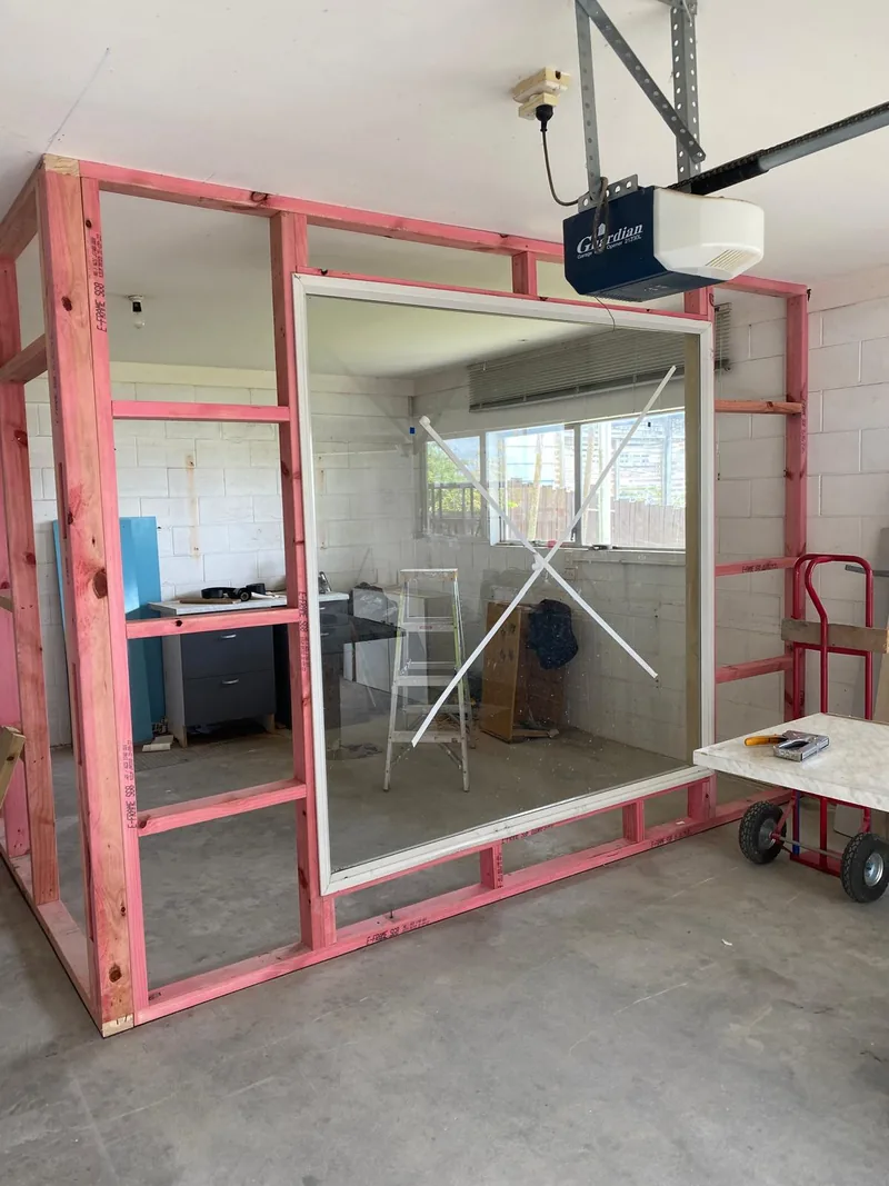 Timber wall framing around a large internal opening during residential construction
